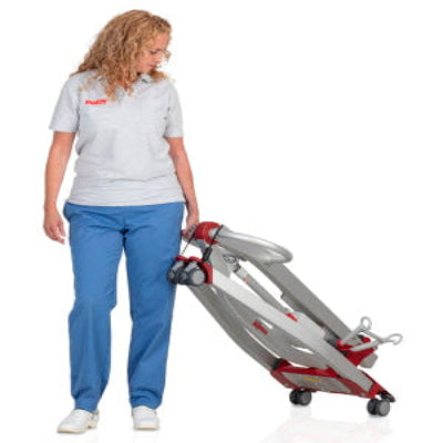Caregiver easily transporting patient lift for disabled - image of Molift Smart 150
